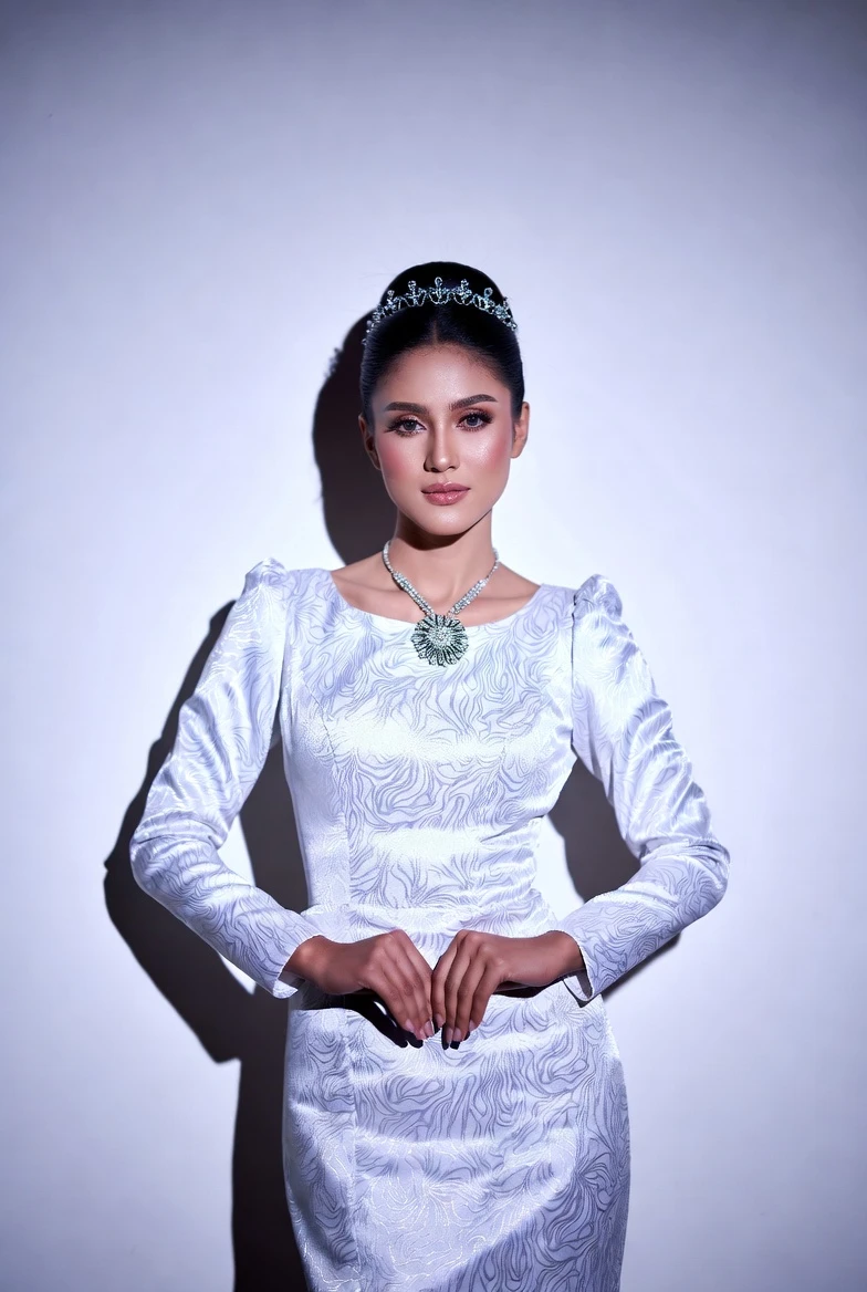 Elevate Your Look with White Textured Long-Sleeve Gown